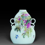 An Over Glazed Double-Faced Moon Flask 'Spring' Vase