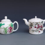 A Set Of Two Over Glazed Teapots