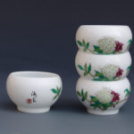 A Set Of Four Over Glazed Floral Bowls