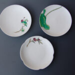 A Set Of Three Over Glazed Floral Dishes