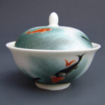An Over Glazed Fish Tea Cup