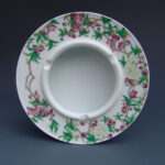 An Over Glazed Floral Ashtray