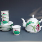 A Set Of Over Glazed Lotus Teapot and Cups