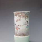 An Over Glazed Playing Children Vase